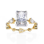 Radiant Central Stone Diamond Ring with Shimmering Side Accents