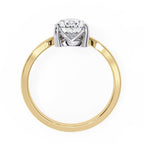 Radiant Central Stone Diamond Ring with Shimmering Side Accents