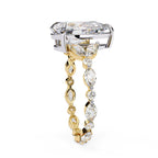 Radiant Central Stone Diamond Ring with Shimmering Side Accents