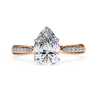 Radiant Central Stone Diamond Ring with Shimmering Side Accents