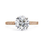 Elegant Central Stone Diamond Ring with Side Stone Accents