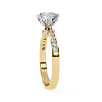 Elegant Central Stone Diamond Ring with Radiant Side Accents