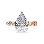 Radiant Central Stone Diamond Ring with Shimmering Side Accents