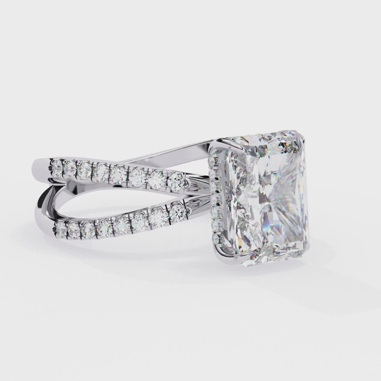 Radiant Central Stone Diamond Ring with Shimmering Side Accents