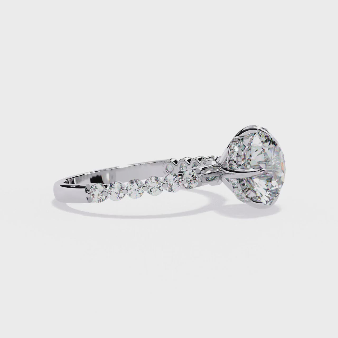 Radiant Central Brilliance Side Stone Ring