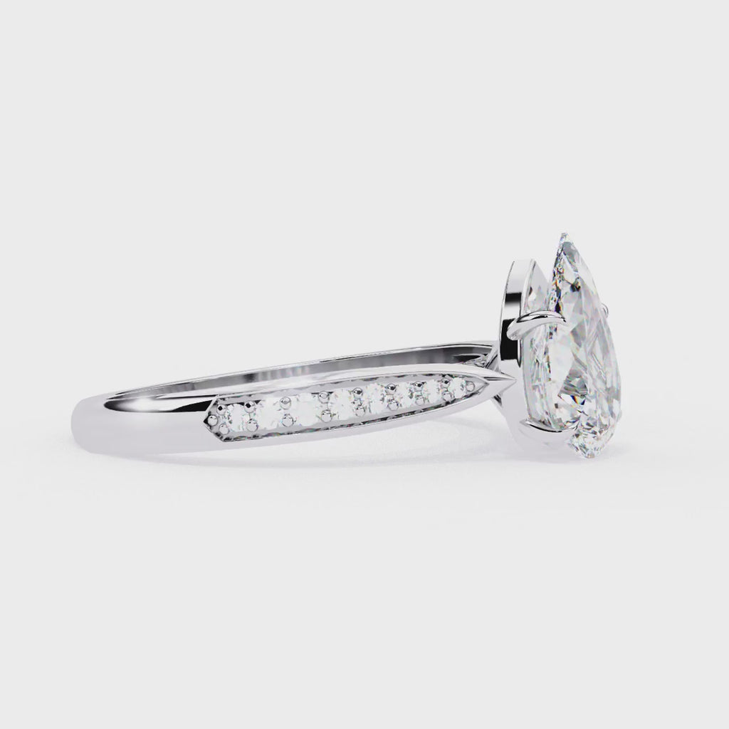 Radiant Central Stone Diamond Ring with Shimmering Side Accents