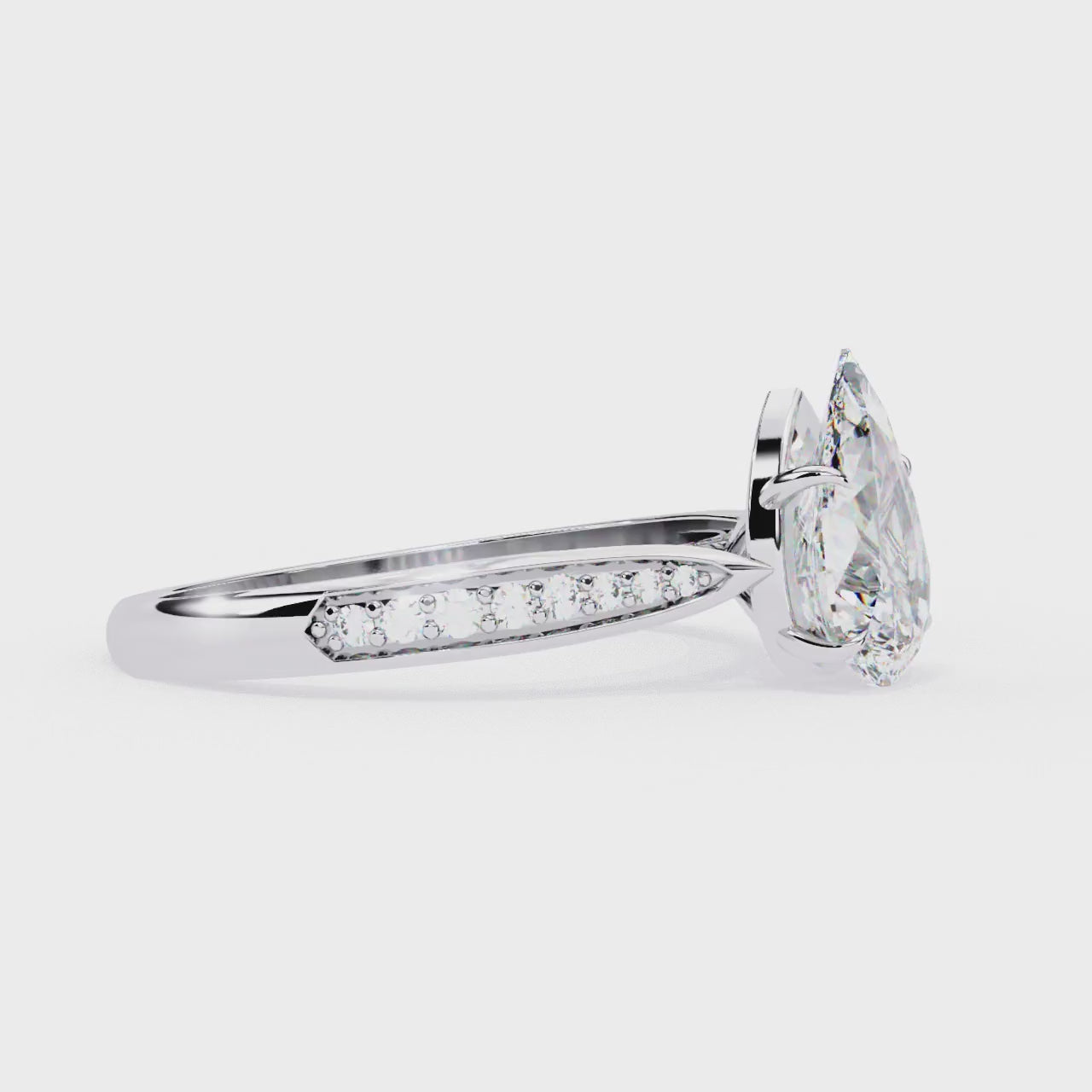 Radiant Central Stone Diamond Ring with Shimmering Side Accents