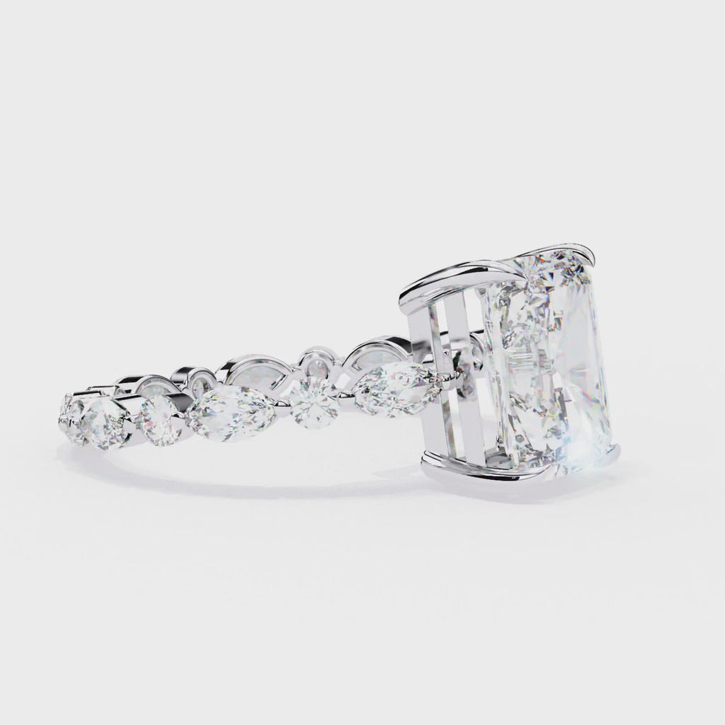 Radiant Central Stone Diamond Ring with Shimmering Side Accents