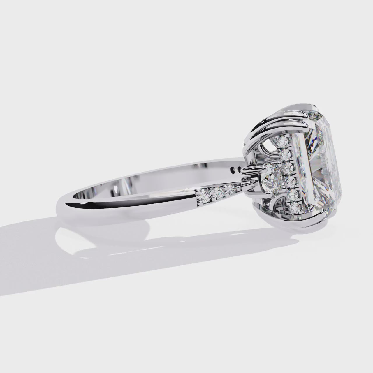 Elegant Central Stone Diamond Ring with Radiant Side Accents