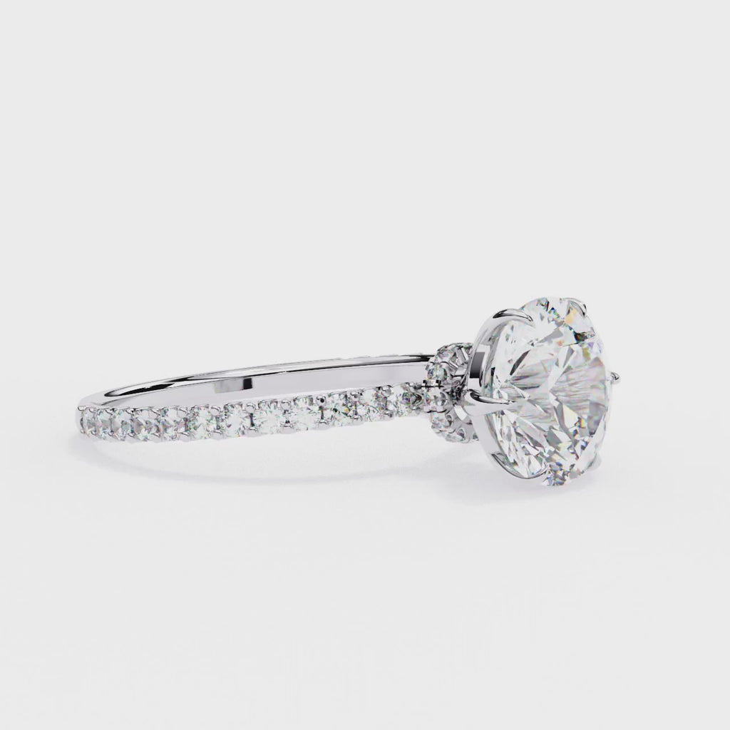 Radiant Central Stone Diamond Ring with Shimmering Side Accents