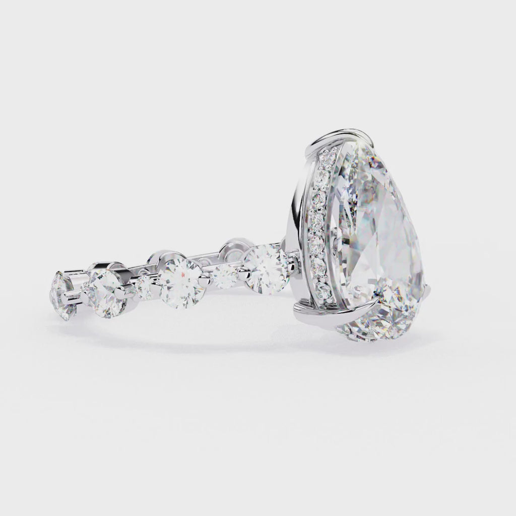 Radiant Central Stone Diamond Ring with Shimmering Side Accents