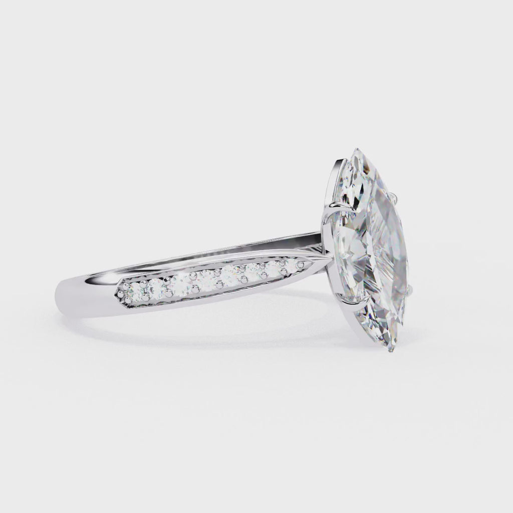 Elegant Central Stone Brilliance Ring with Shimmering Side Accents