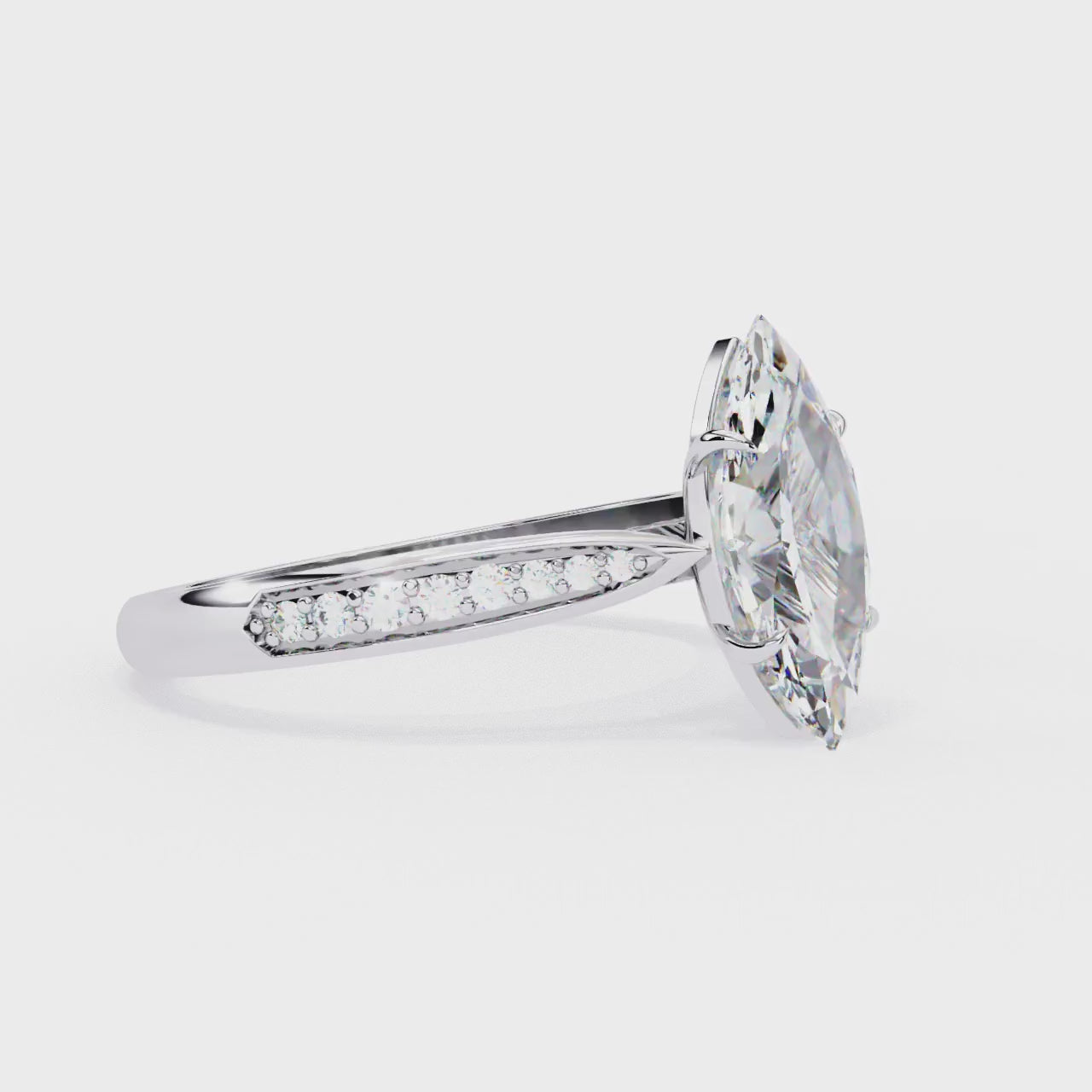 Elegant Central Stone Brilliance Ring with Shimmering Side Accents