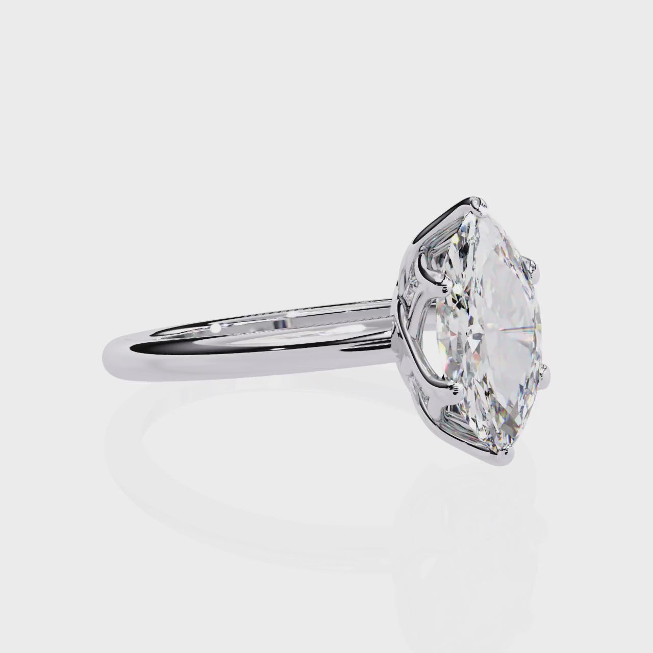 Elegant Central Stone Diamond Ring with Side Accents