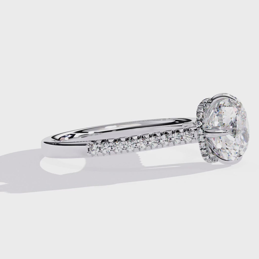 Elegant Central Stone Diamond Ring with Side Stone Accents