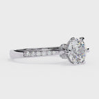 Elegant Central Stone Diamond Ring with Radiant Side Accents