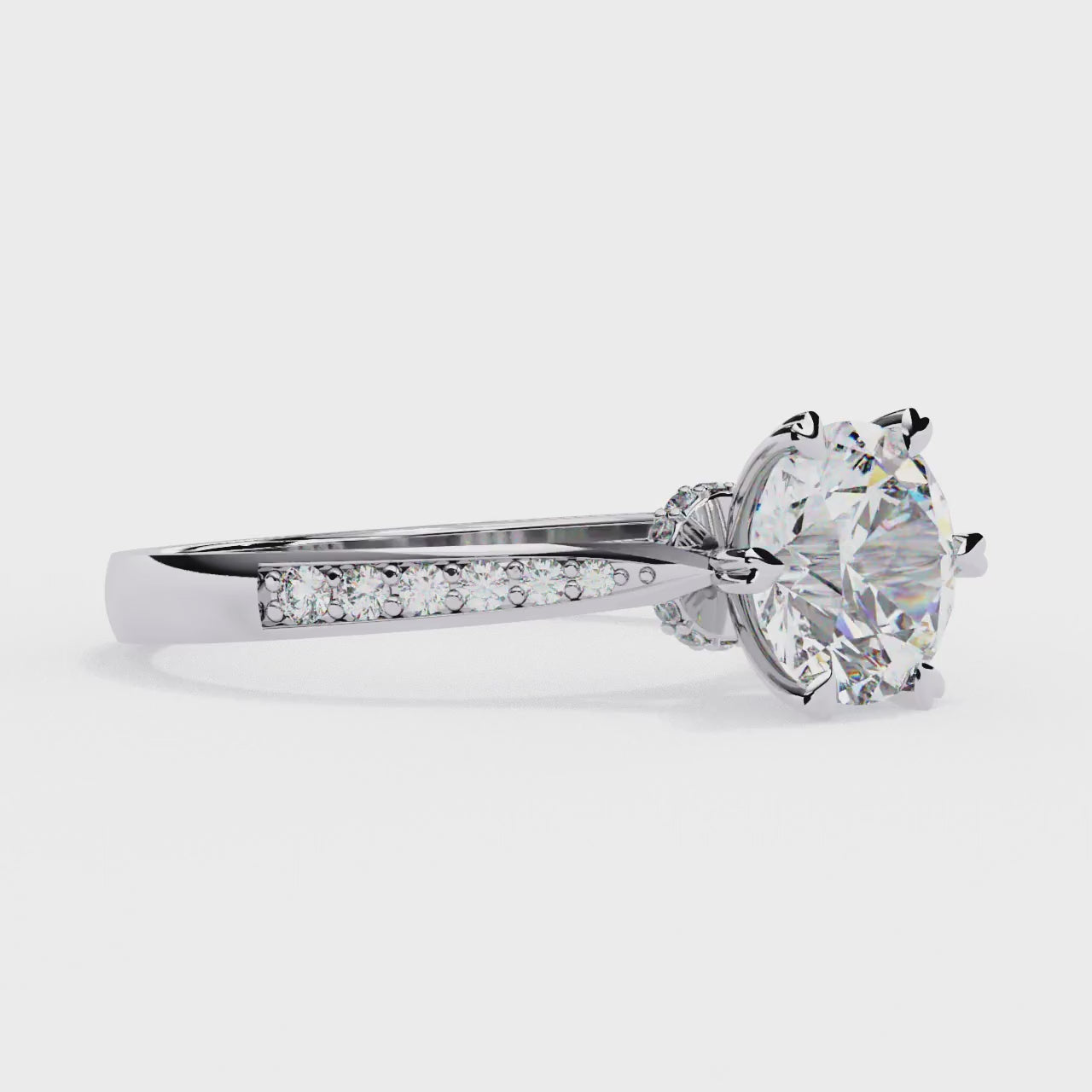 Elegant Central Stone Diamond Ring with Radiant Side Accents