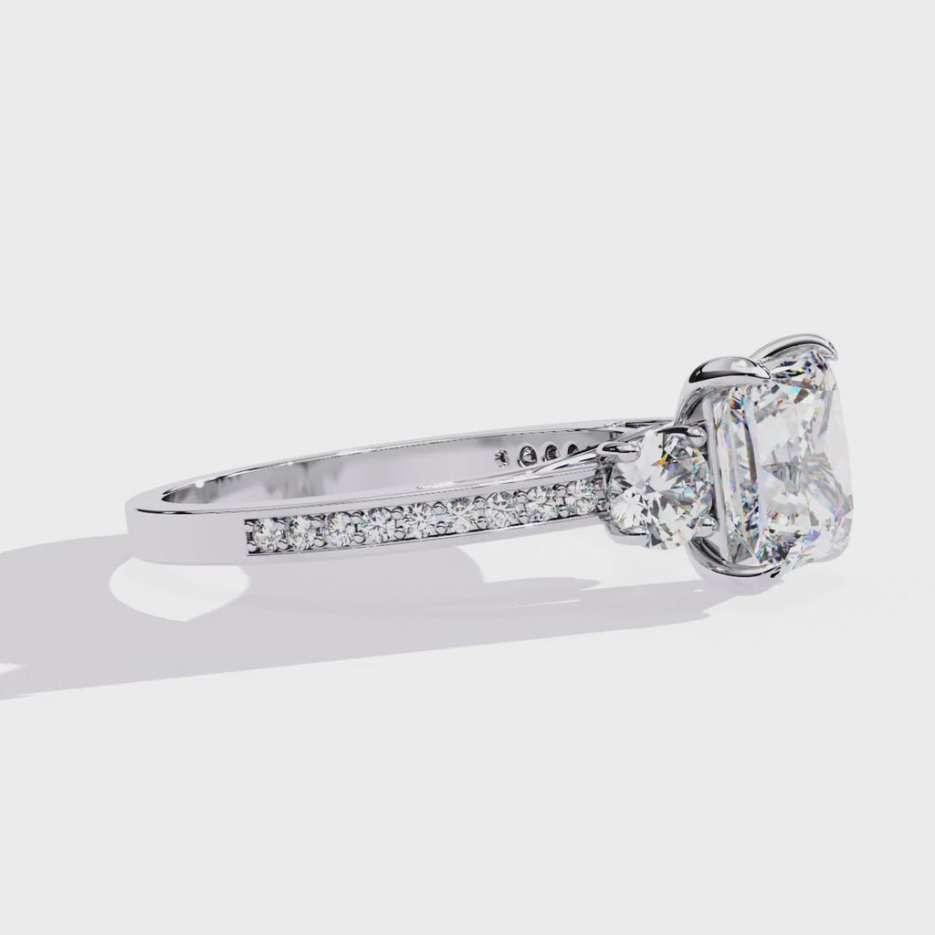 Elegant Diamond Central Stone Ring with Shimmering Side Accents