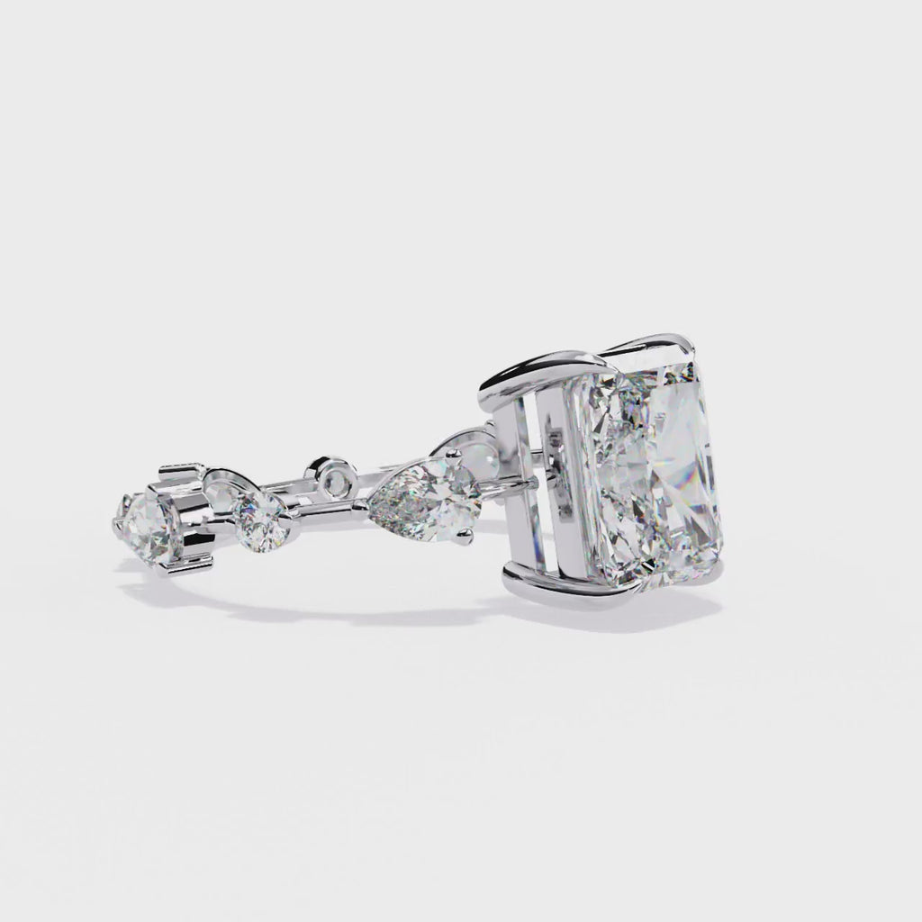 Radiant Central Stone Diamond Ring with Shimmering Side Accents