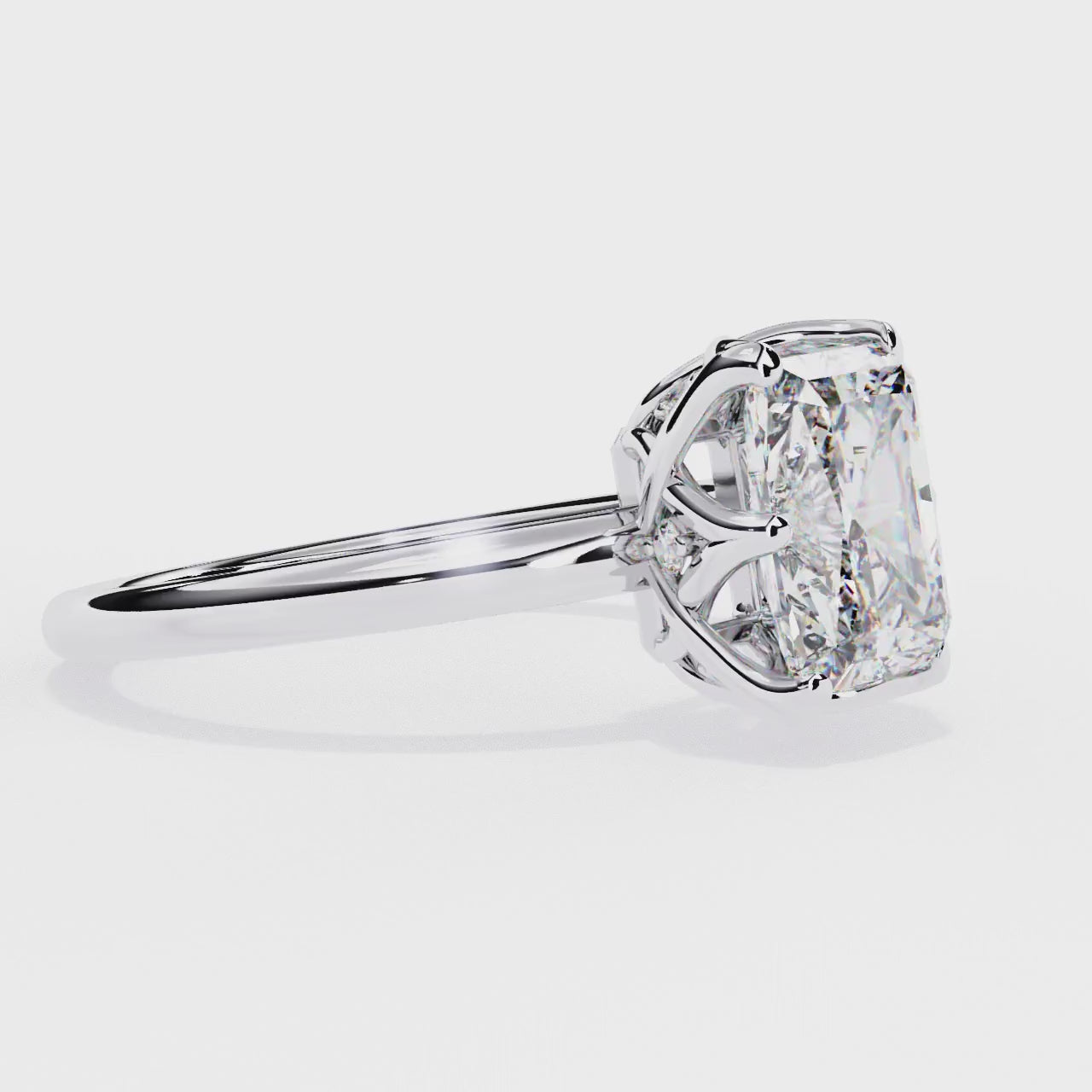 Elegant Central Stone Diamond Ring with Radiant Side Accents