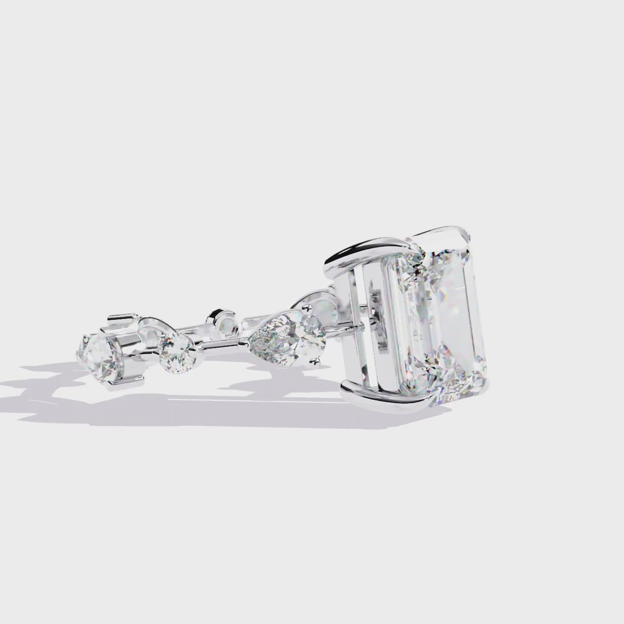 Radiant Central Stone Diamond Ring with Shimmering Side Accents