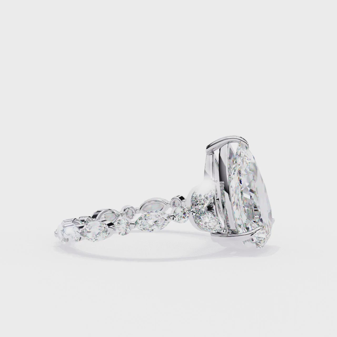 Radiant Central Stone Diamond Ring with Shimmering Side Accents