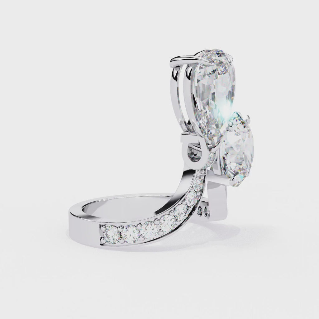 Radiant Central Brilliance Diamond Ring with Elegant Side Stones