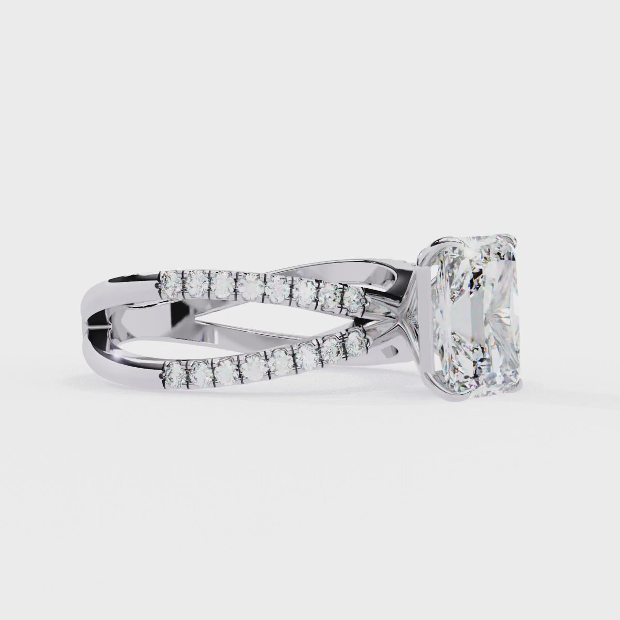 Radiant Central Stone Diamond Ring with Shimmering Side Accents
