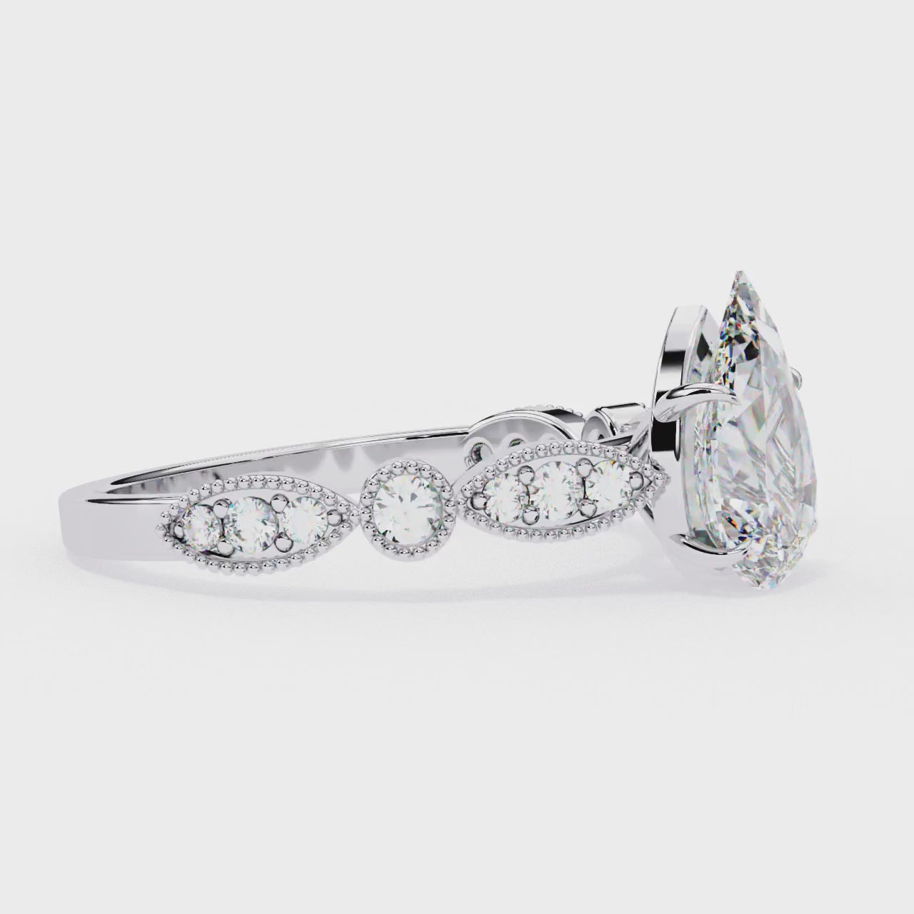 Radiant Central Stone Diamond Ring with Shimmering Side Accents