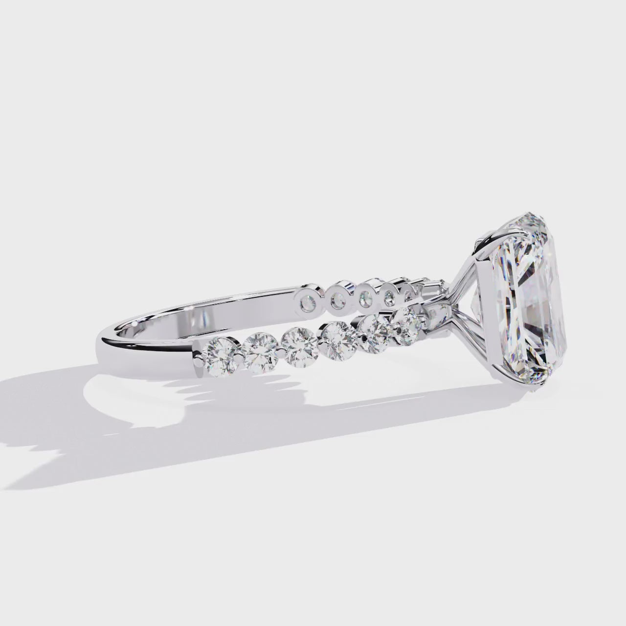 Radiant Central Stone Diamond Ring with Shimmering Accents
