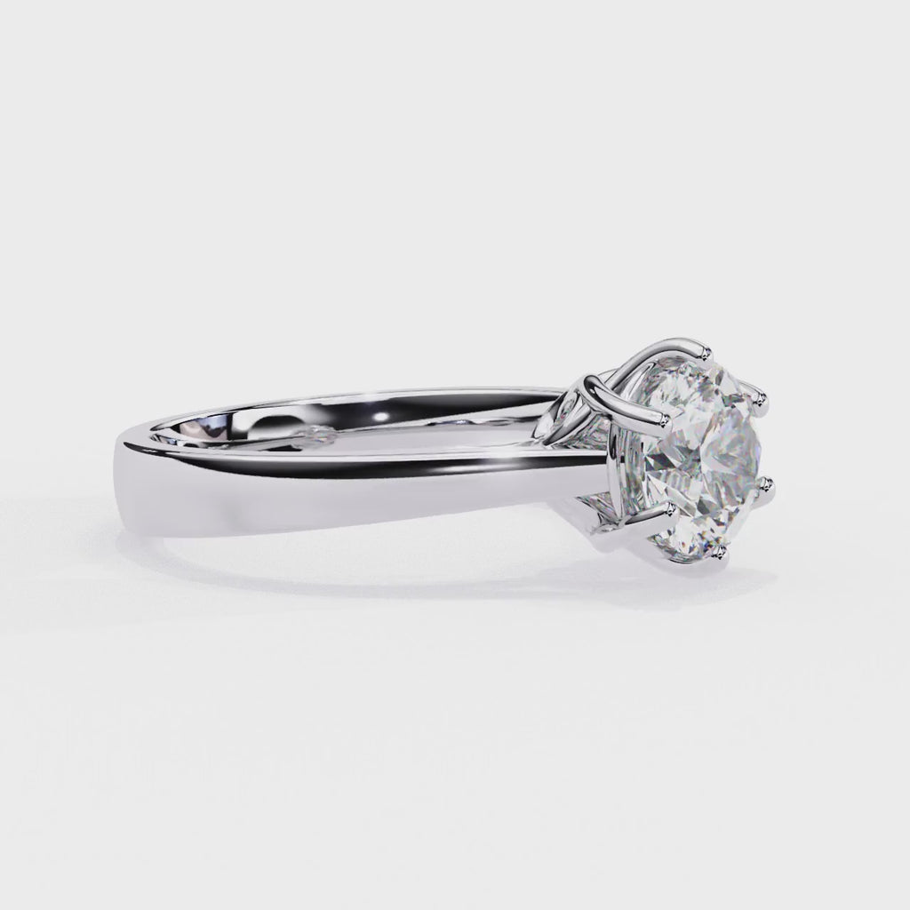 Elegant Central Stone Diamond Ring with Radiant Side Accents