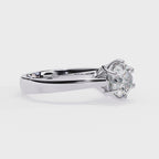 Elegant Central Stone Diamond Ring with Radiant Side Accents